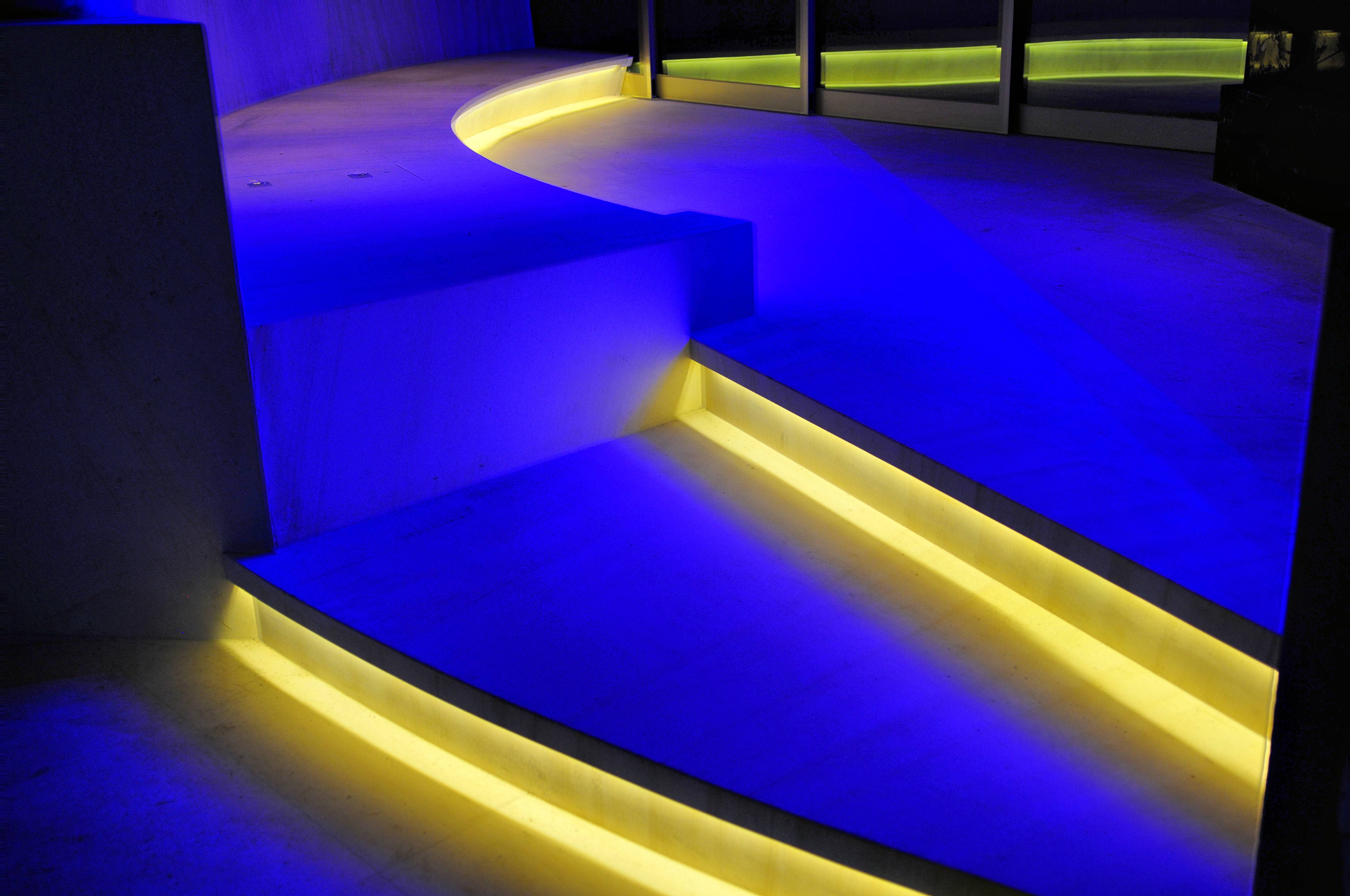 Stairwell lit by colored LED lights